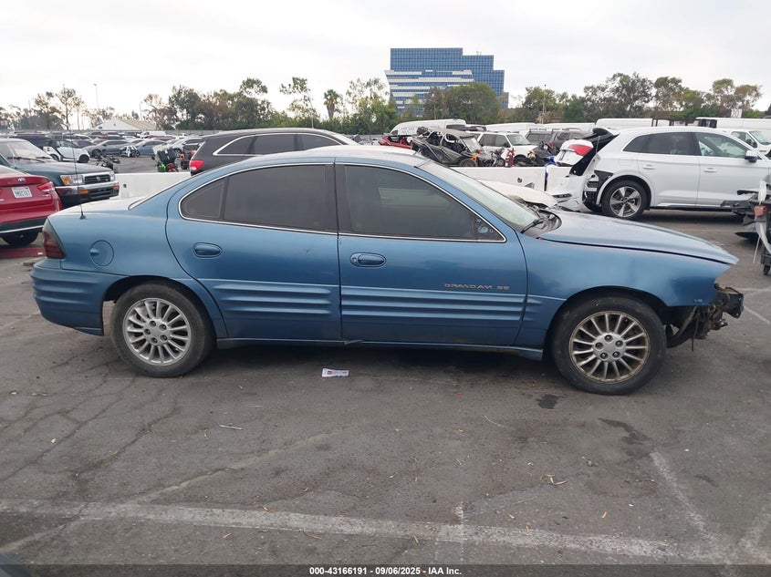 1999 Pontiac Grand Am Se VIN: 1G2NE52E9XM875453 Lot: 43166191