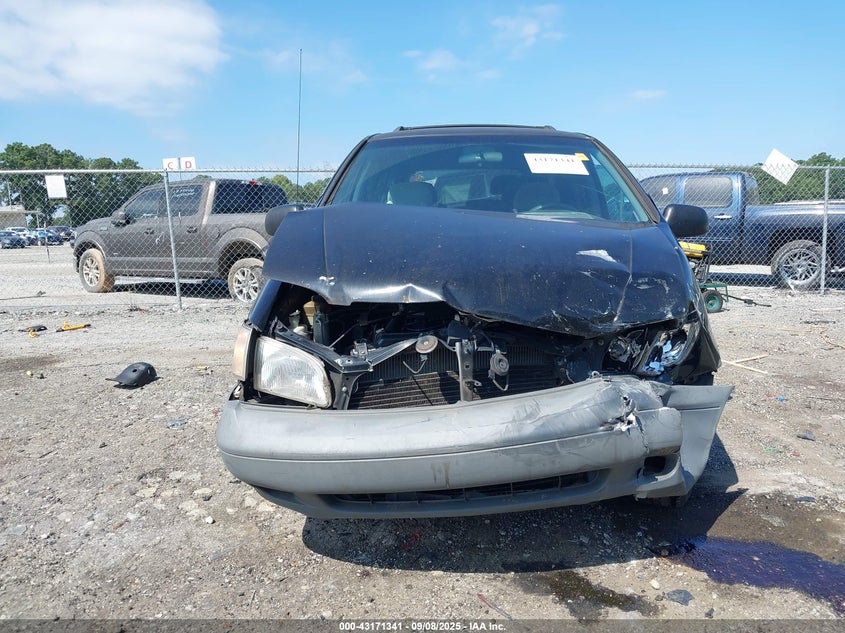 2000 Toyota Sienna Le VIN: 4T3ZF13C6YU244793 Lot: 43171341