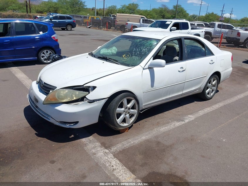2002 Toyota Camry JTDBF32K320019569 photo 1