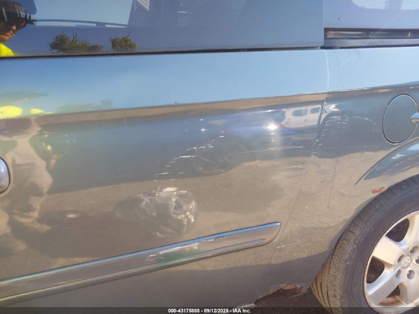 2005 Dodge Grand Caravan Sxt VIN: 2D8GP44LX5R249555 Lot: 43175888