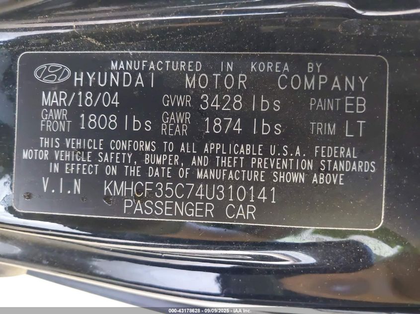 2004 Hyundai Accent VIN: KMHCF35C74U310141 Lot: 43178628