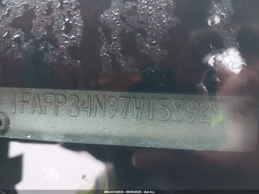 2007 Ford Focus S/Se/Ses VIN: 1FAFP34N97W158928 Lot: 43182530