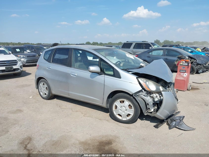 2012 Honda Fit silver hatchback gasoline JHMGE8H30CS005428 photo #1