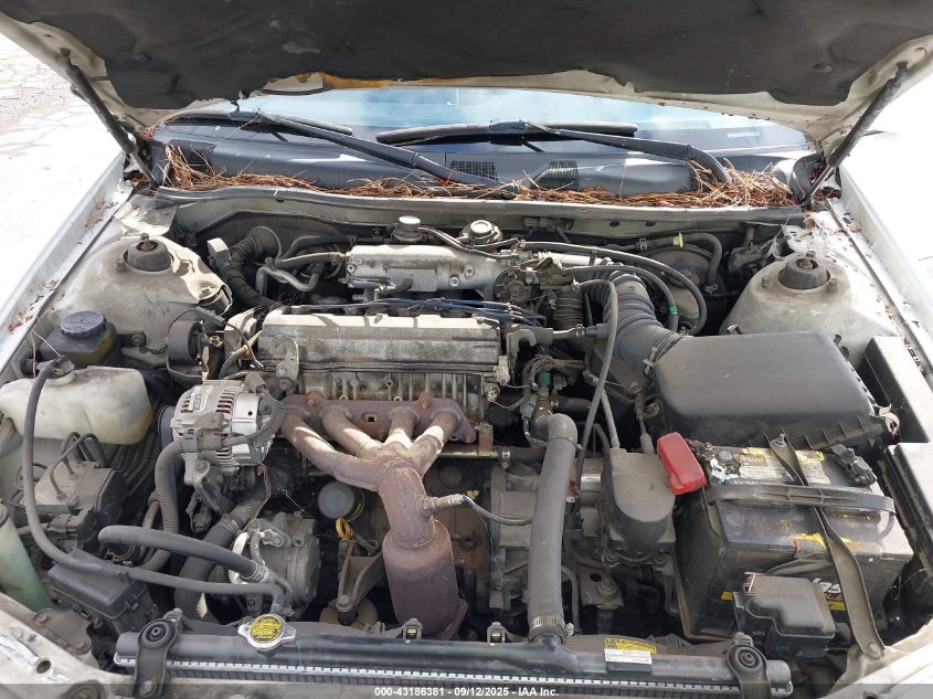 2000 Toyota Camry Le VIN: JT2BG22KXY0392052 Lot: 43186381