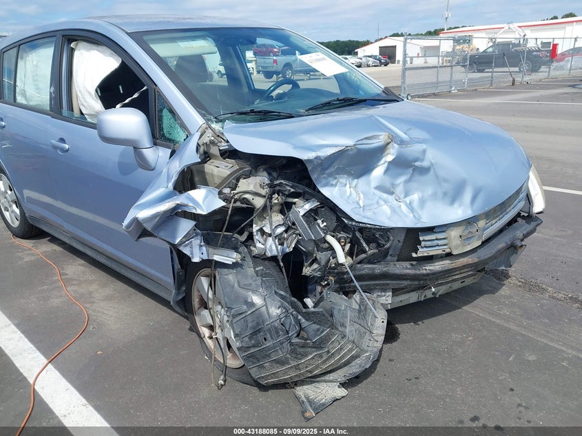 2009 Nissan Versa 1.8Sl VIN: 3N1BC13E09L410085 Lot: 43188085