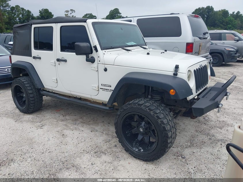 1J4BA3H11AL125443 2010 Jeep Wrangler Unlimited Sport auction photo 1