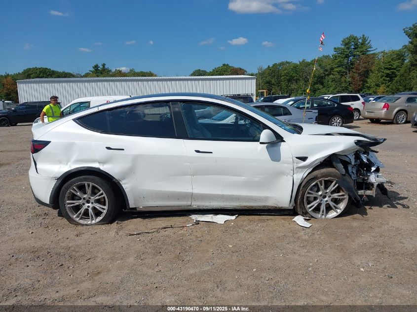 2023 Tesla Model Y Awd/Long Range Dual Motor All-Wheel Drive VIN: 7SAYGDEE8PA126452 Lot: 43190470