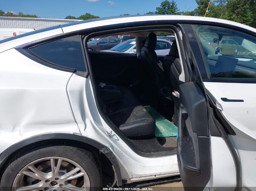 2023 Tesla Model Y Awd/Long Range Dual Motor All-Wheel Drive VIN: 7SAYGDEE8PA126452 Lot: 43190470