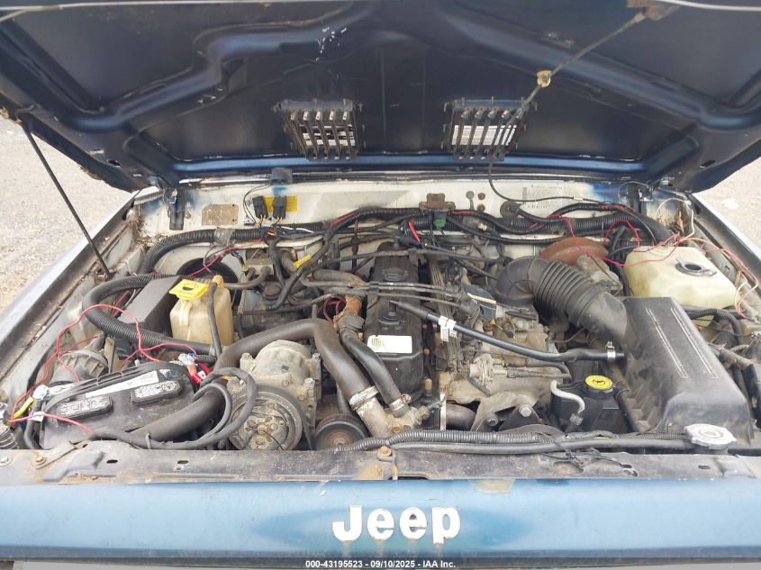 1991 Jeep Cherokee Laredo VIN: 1J4FJ58SXML597313 Lot: 43195523