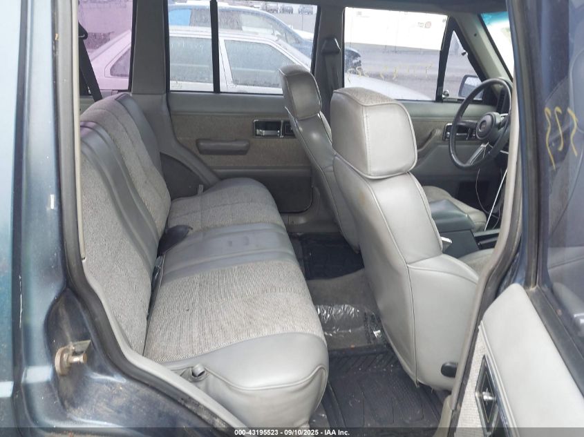 1991 Jeep Cherokee Laredo VIN: 1J4FJ58SXML597313 Lot: 43195523