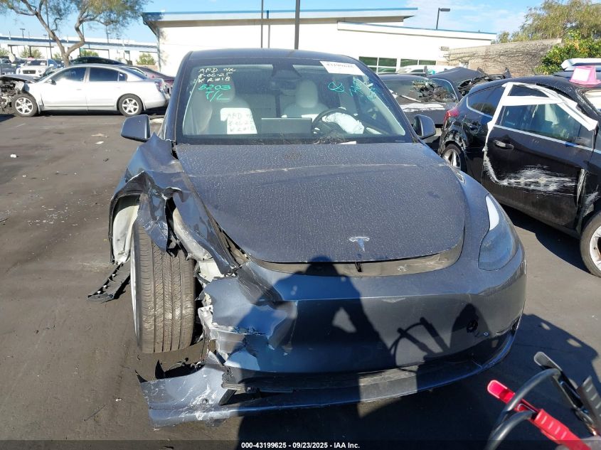 2023 Tesla Model Y Awd/Long Range Dual Motor All-Wheel Drive VIN: 7SAYGDEE4PF903647 Lot: 43199625