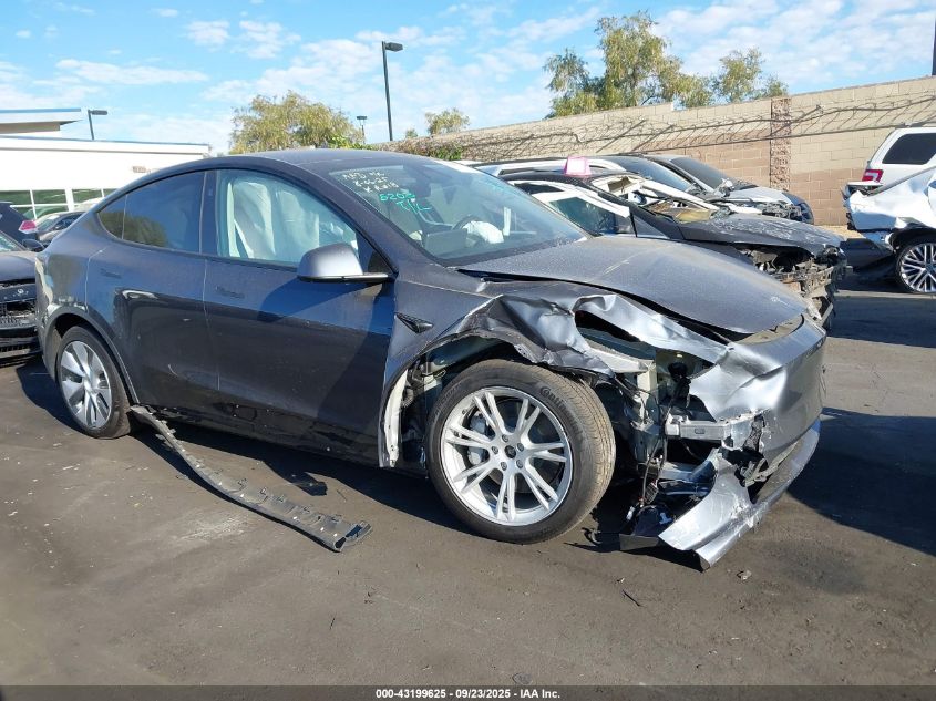 2023 Tesla Model Y Awd/Long Range Dual Motor All-Wheel Drive VIN: 7SAYGDEE4PF903647 Lot: 43199625