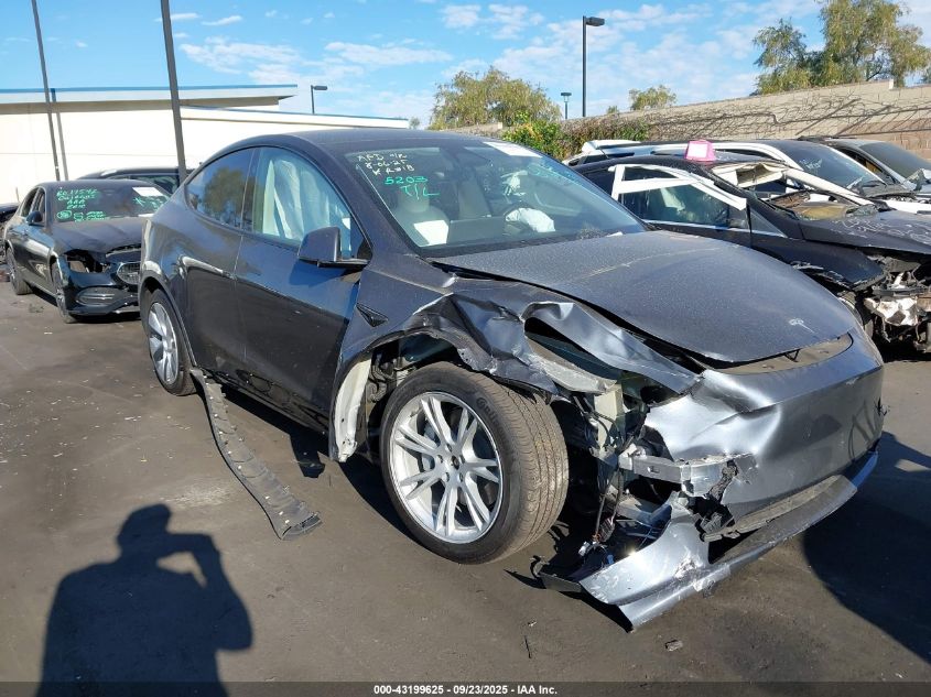 2023 Tesla Model Y Awd/Long Range Dual Motor All-Wheel Drive VIN: 7SAYGDEE4PF903647 Lot: 43199625