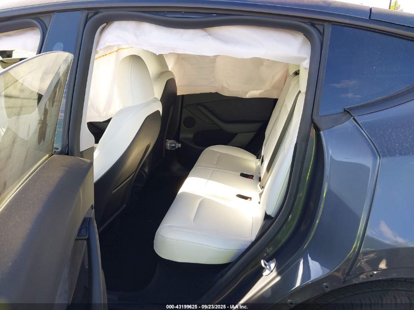 2023 Tesla Model Y Awd/Long Range Dual Motor All-Wheel Drive VIN: 7SAYGDEE4PF903647 Lot: 43199625