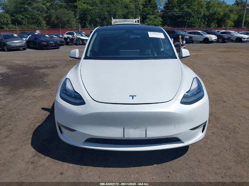 2023 Tesla Model Y Awd/Long Range Dual Motor All-Wheel Drive VIN: 7SAYGDEE2PA037122 Lot: 43202172