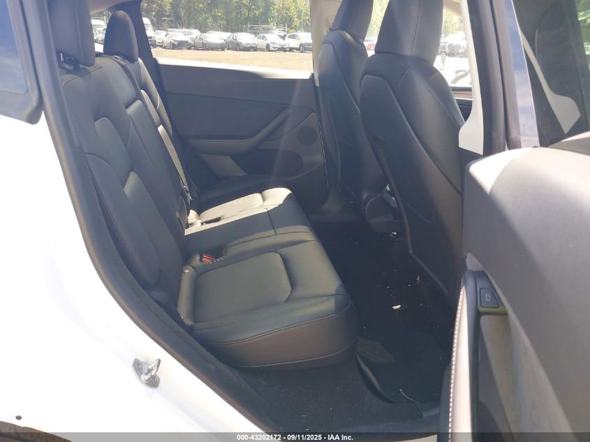 2023 Tesla Model Y Awd/Long Range Dual Motor All-Wheel Drive VIN: 7SAYGDEE2PA037122 Lot: 43202172