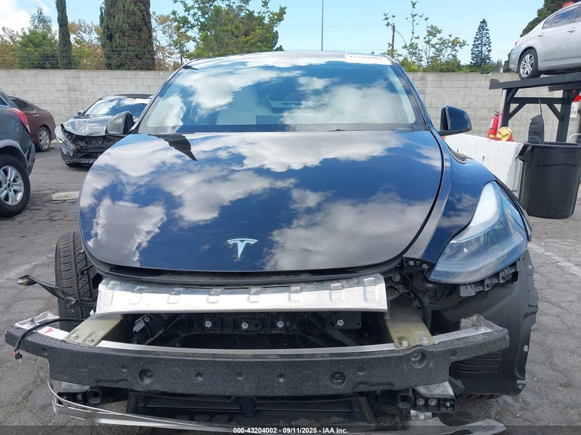 2024 Tesla Model Y Long Range Dual Motor All-Wheel Drive/Rwd VIN: 7SAYGDED1RF122837 Lot: 43204002