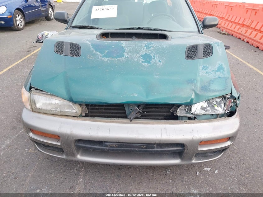 1997 Subaru Impreza Outback Sport VIN: JF1GF485XVG821809 Lot: 43205637