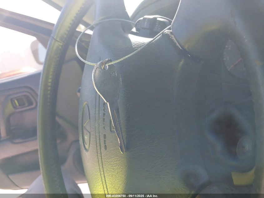 1999 Infiniti G20 Standard/Touring VIN: JNKCP11A3XT015962 Lot: 43206750