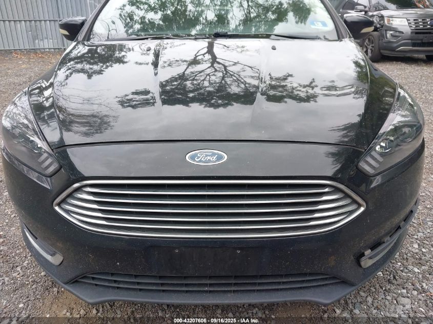 2018 Ford Focus Titanium VIN: 1FADP3J21JL323946 Lot: 43207606