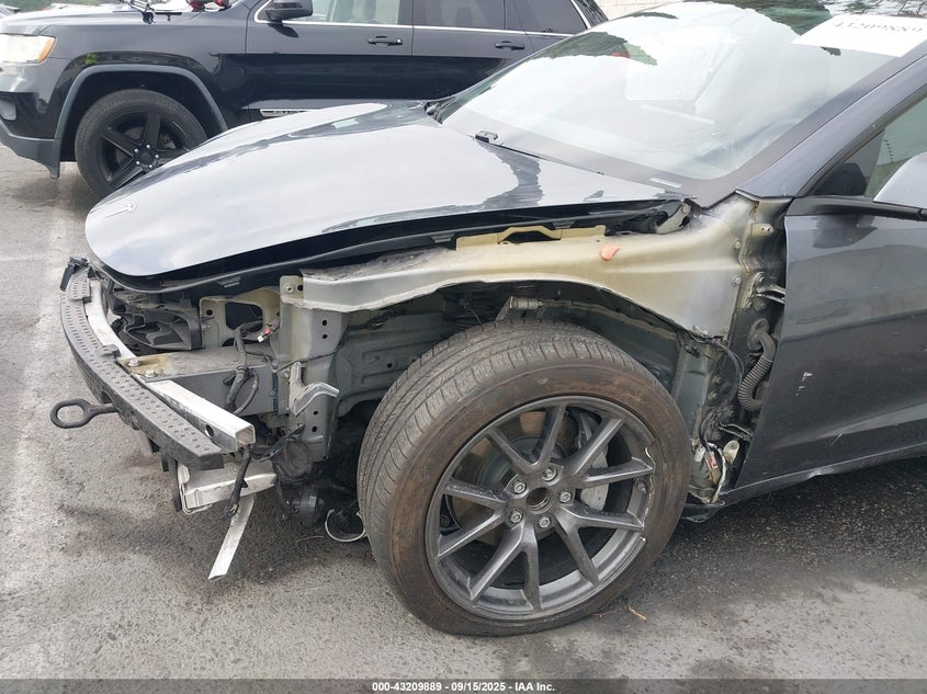 2021 Tesla Model 3 Standard Range Plus Rear-Wheel Drive VIN: 5YJ3E1EA4MF919335 Lot: 43209889