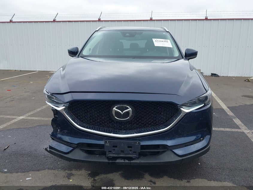 2021 Mazda Cx-5 Grand Touring VIN: JM3KFBDM8M0378919 Lot: 43210391