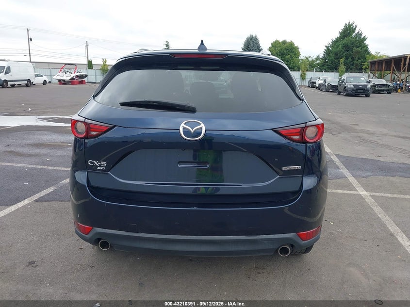2021 Mazda Cx-5 Grand Touring VIN: JM3KFBDM8M0378919 Lot: 43210391