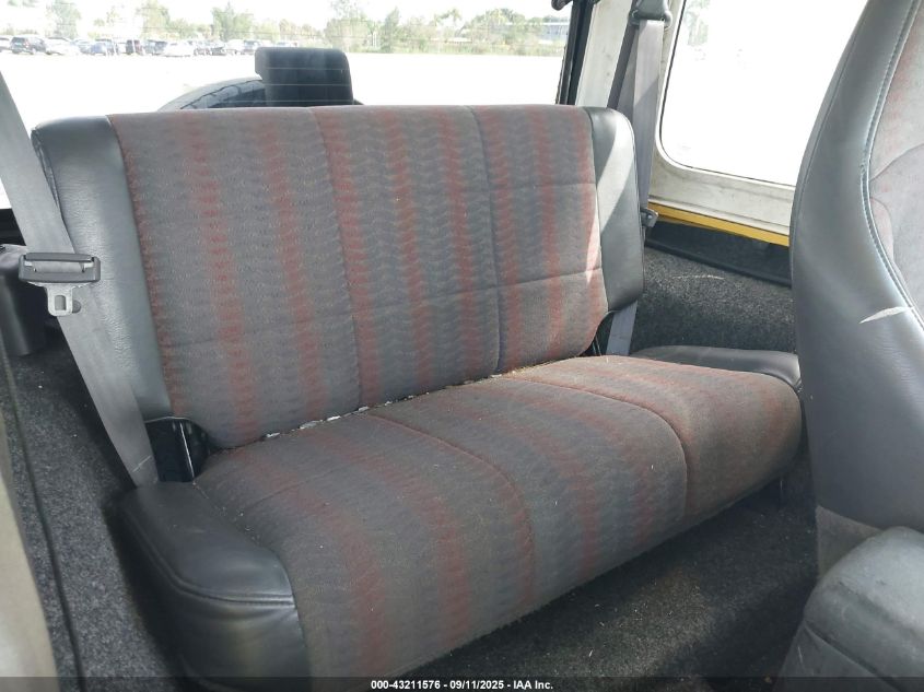 2000 Jeep Wrangler Sport VIN: 1J4FA49S8YP735602 Lot: 43211576