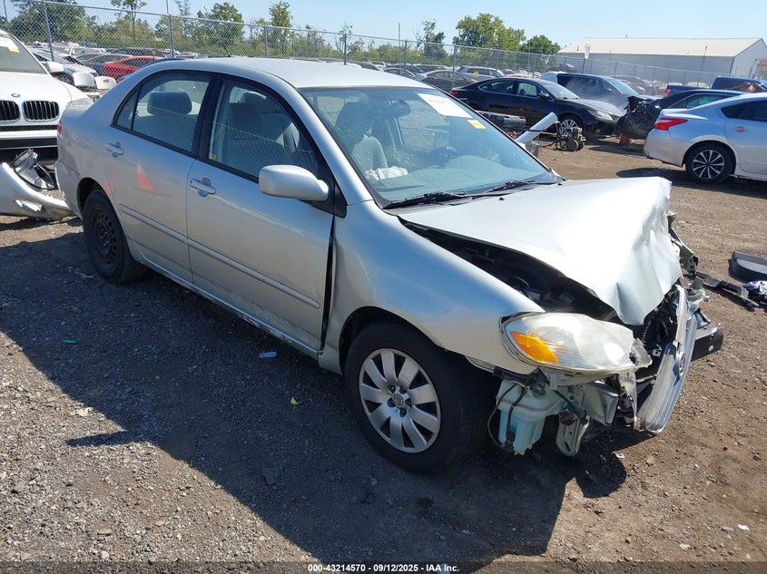2004 Toyota Corolla Le silver sedan gasoline JTDBR38E842036268 photo #1
