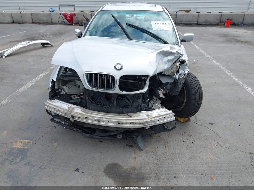 2002 BMW 325I VIN: WBAET37492NG73611 Lot: 43216751