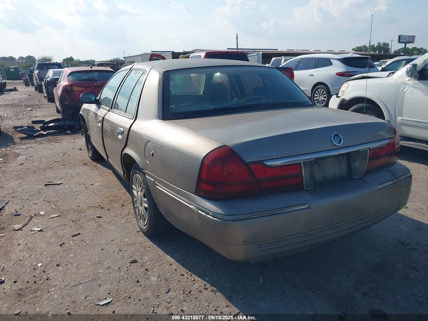 2005 Mercury Grand Marquis Gs gold sedan gasoline 2MEFM74W25X625920 photo #4