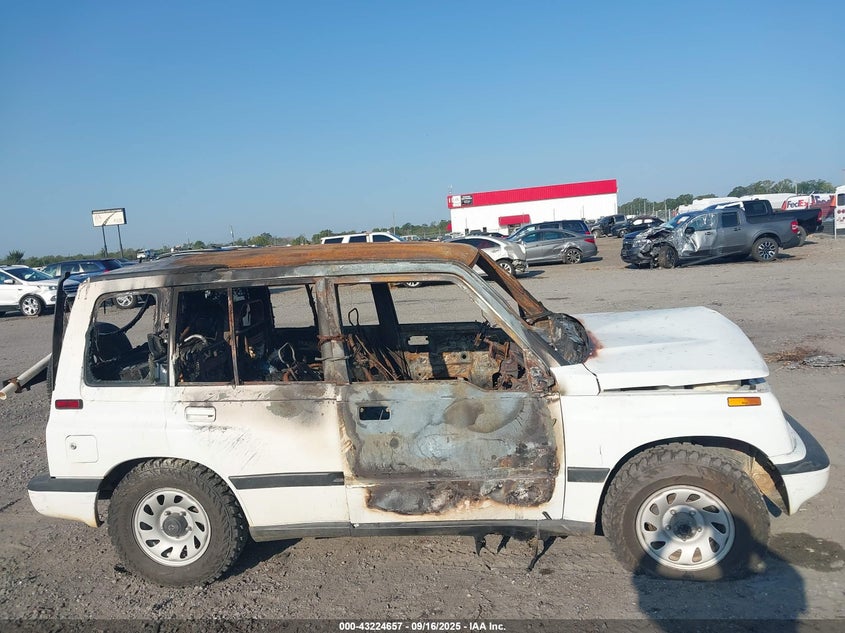 1996 Suzuki Sidekick Jx VIN: 2S3TD03V4T6410158 Lot: 43224657