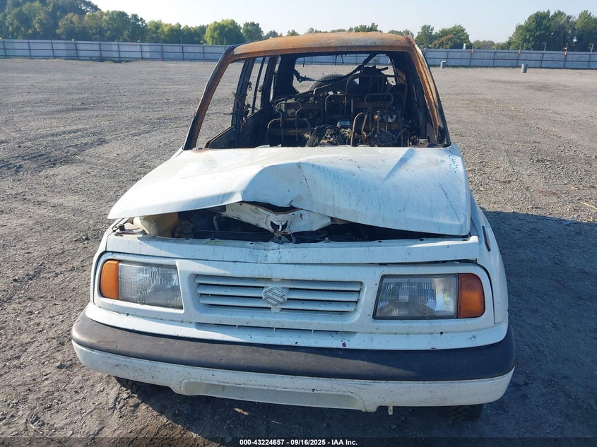 1996 Suzuki Sidekick Jx VIN: 2S3TD03V4T6410158 Lot: 43224657