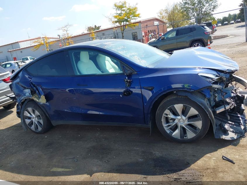 2023 Tesla Model Y Awd/Long Range Dual Motor All-Wheel Drive VIN: 7SAYGDEE6PF615256 Lot: 43228355