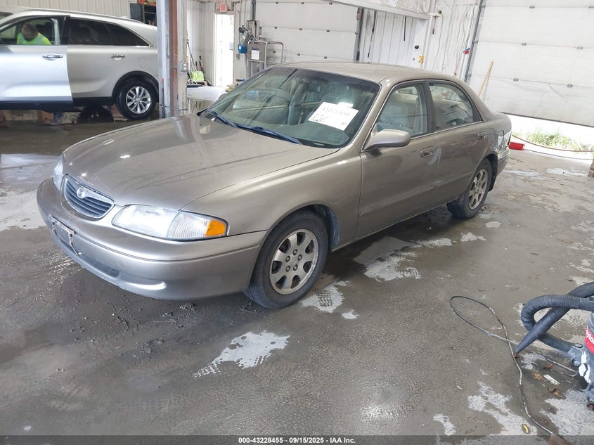 1YVGF22C6X5893816 1999 MAZDA 626 photo no. 2