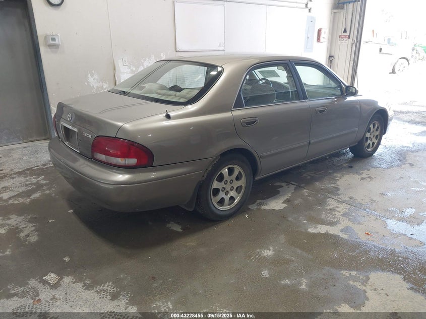 1YVGF22C6X5893816 1999 MAZDA 626 photo no. 4