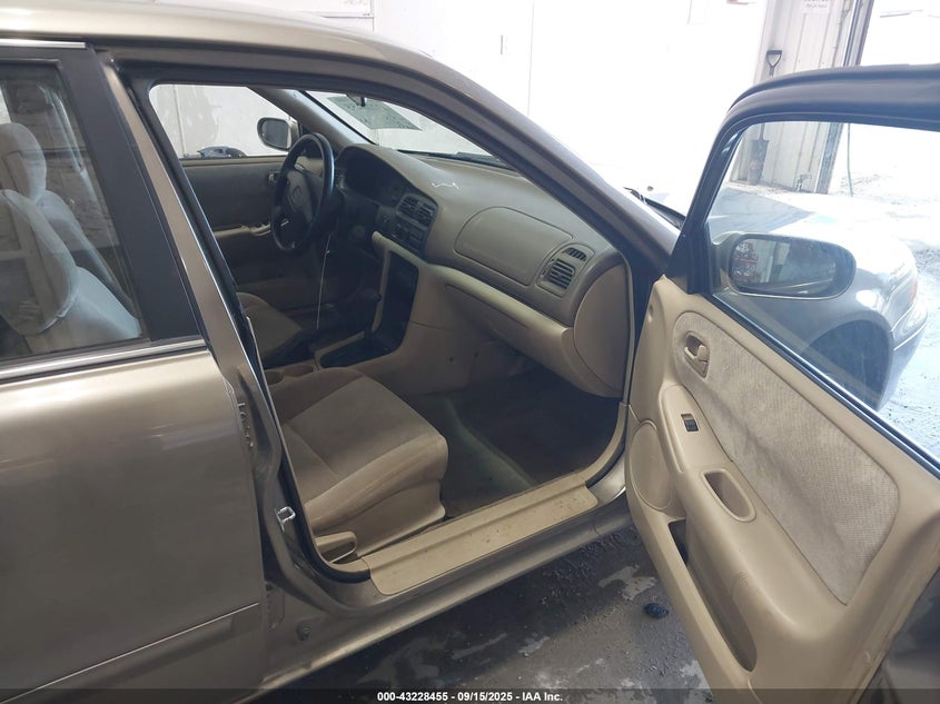 1YVGF22C6X5893816 1999 MAZDA 626 photo no. 5