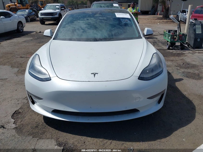 2021 Tesla Model 3 Standard Range Plus Rear-Wheel Drive VIN: 5YJ3E1EA1MF000778 Lot: 43229701