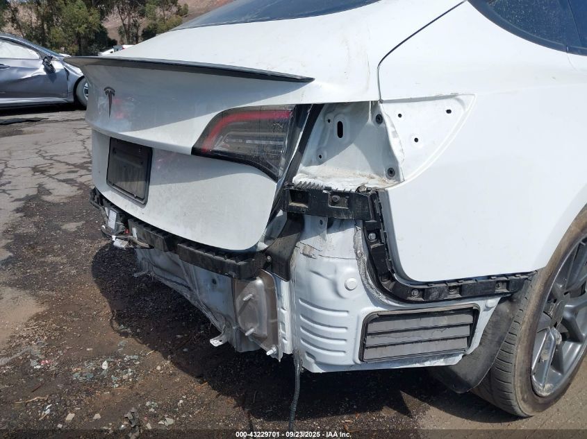 2021 Tesla Model 3 Standard Range Plus Rear-Wheel Drive VIN: 5YJ3E1EA1MF000778 Lot: 43229701