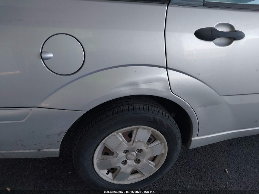 2007 Ford Focus Se/Ses VIN: 1FAFP36N97W214900 Lot: 43230287