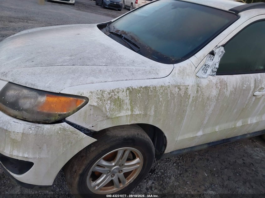 2012 Hyundai Santa Fe Gls VIN: 5XYZGDAB2CG092009 Lot: 43231077