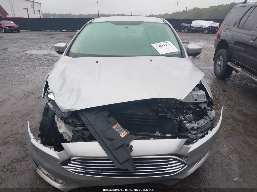 2016 Ford Focus Titanium VIN: 1FADP3N2XGL274880 Lot: 43231974