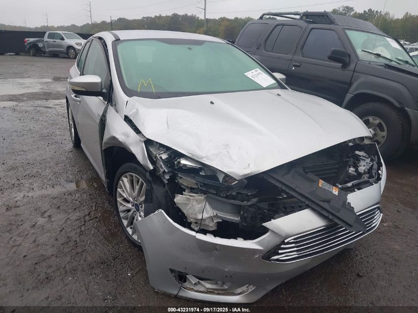 2016 Ford Focus Titanium VIN: 1FADP3N2XGL274880 Lot: 43231974