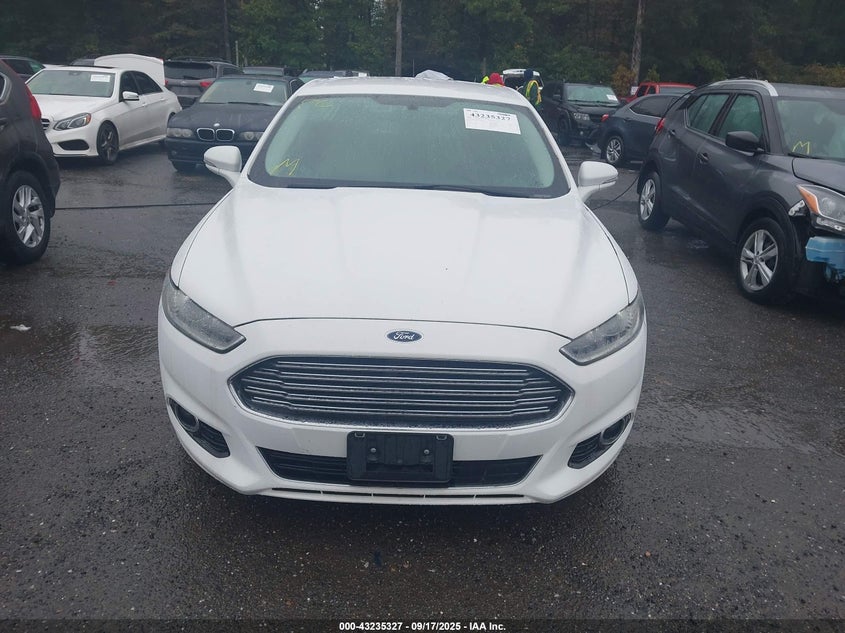 2015 Ford Fusion Hybrid Titanium VIN: 3FA6P0RU8FR116699 Lot: 43235327