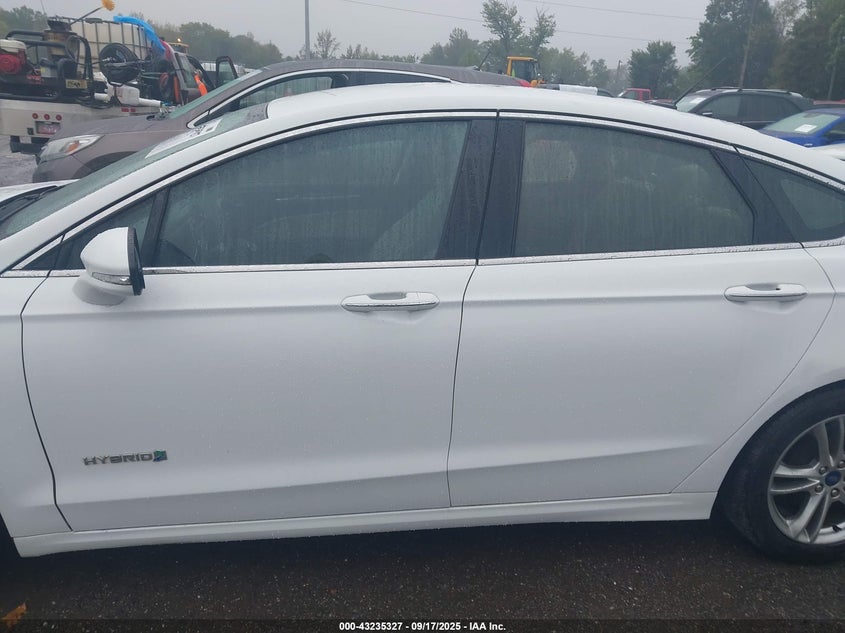 2015 Ford Fusion Hybrid Titanium VIN: 3FA6P0RU8FR116699 Lot: 43235327