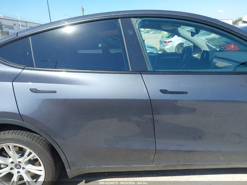 2023 Tesla Model Y Awd/Long Range Dual Motor All-Wheel Drive VIN: 7SAYGDEE4PA144270 Lot: 43236379