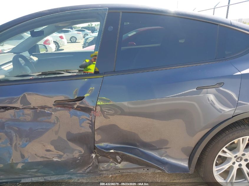 2023 Tesla Model Y Awd/Long Range Dual Motor All-Wheel Drive VIN: 7SAYGDEE4PA144270 Lot: 43236379