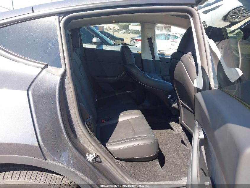 2023 Tesla Model Y Awd/Long Range Dual Motor All-Wheel Drive VIN: 7SAYGDEE4PA144270 Lot: 43236379