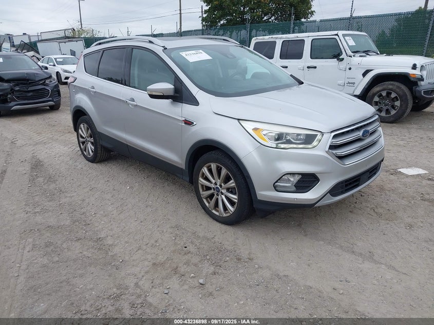 1FMCU0J9XHUA75058 2017 Ford Escape Titanium auction photo 1