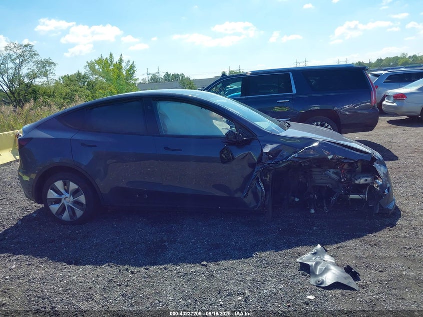 2023 Tesla Model Y Awd/Long Range Dual Motor All-Wheel Drive VIN: 7SAYGDEE8PF847017 Lot: 43237209